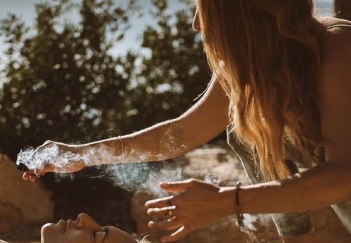 A quiet outdoor Wild Gathering ritual in warm sunlight